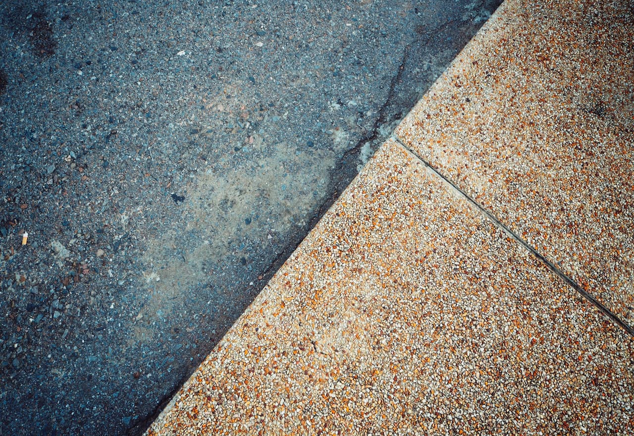 Thumbnail-For-Concrete Vs. Asphalt What's Right for Your Driveway-By- Father & Son YYC